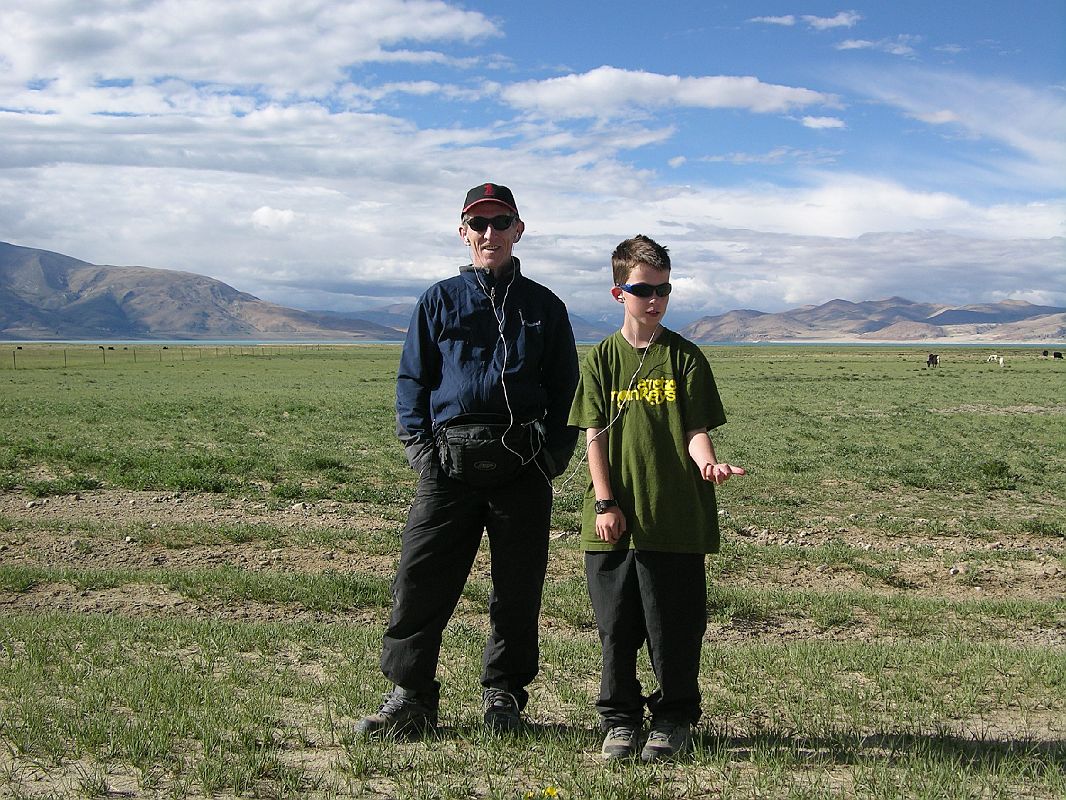 Tibet Kailash 11 Back 07 Listening to Ipod With Peiku Tso behind - Waiting For Landcruiser To Be Fixed